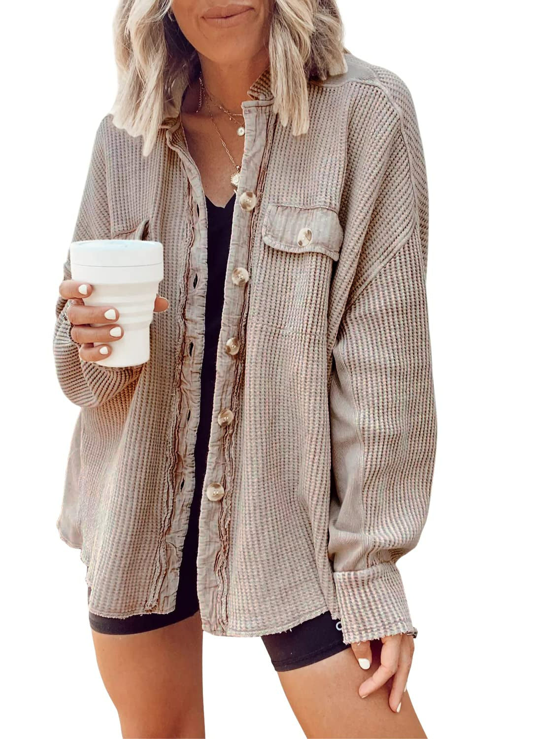 Woman wearing Snuvelle button-up lapel shirt jacket in a solid color
