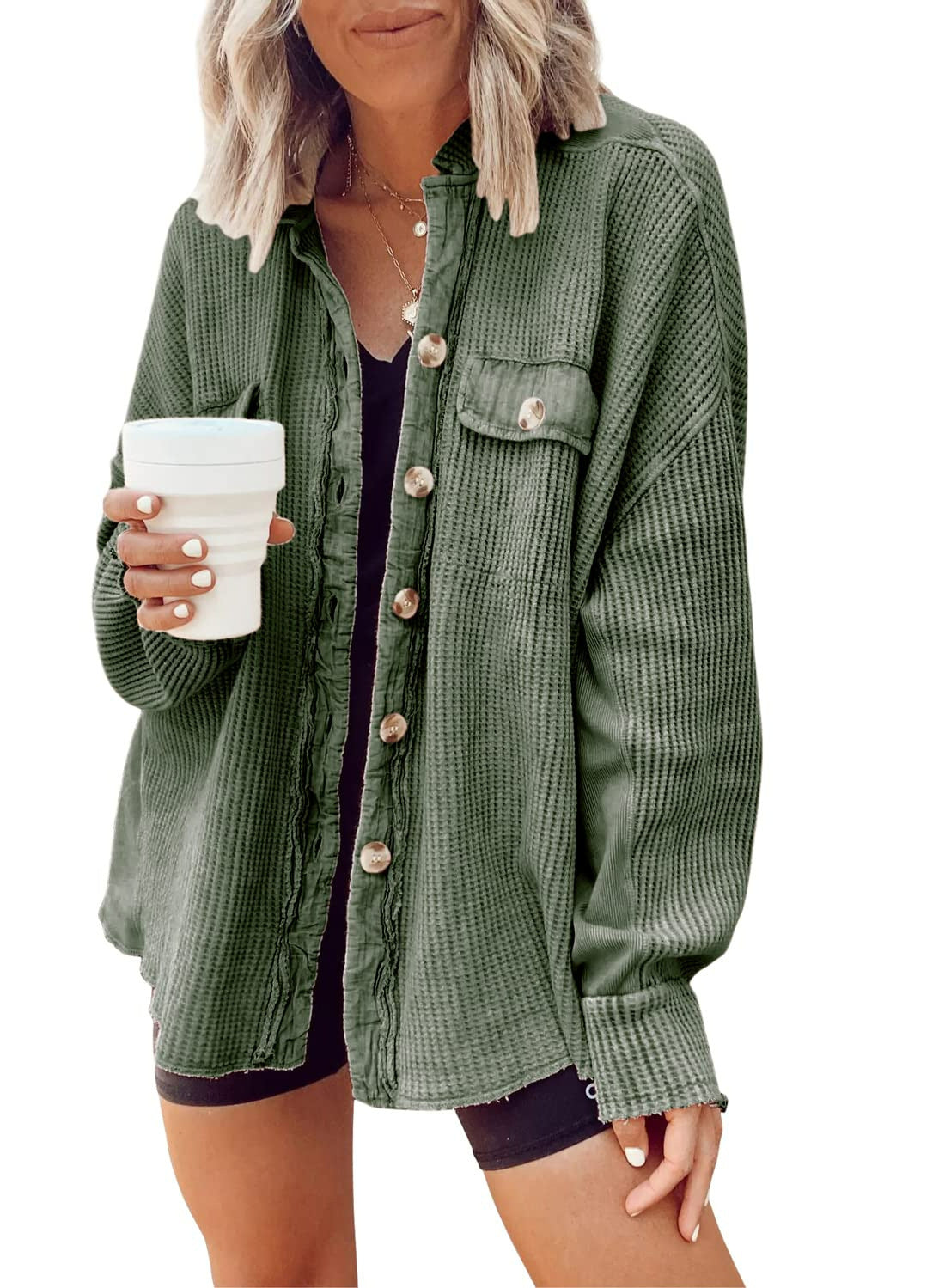 Woman wearing Snuvelle button-up lapel shirt jacket in a solid color