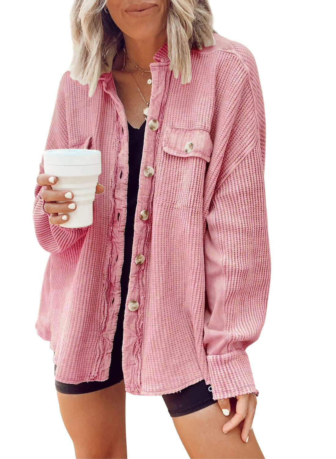 Woman wearing Snuvelle button-up lapel shirt jacket in a solid color