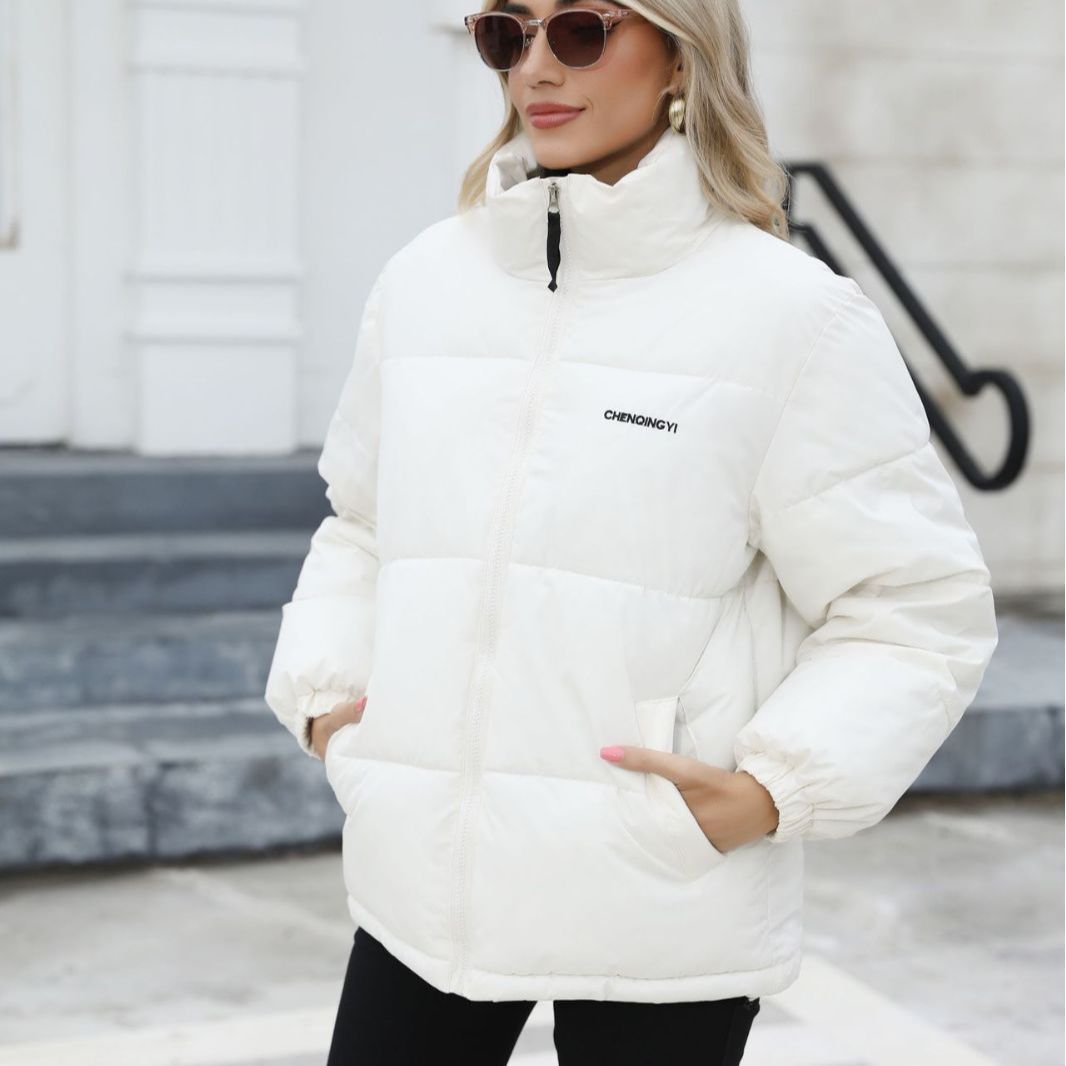 Woman wearing Snuvelle loose fit thick winter jacket in a solid color
