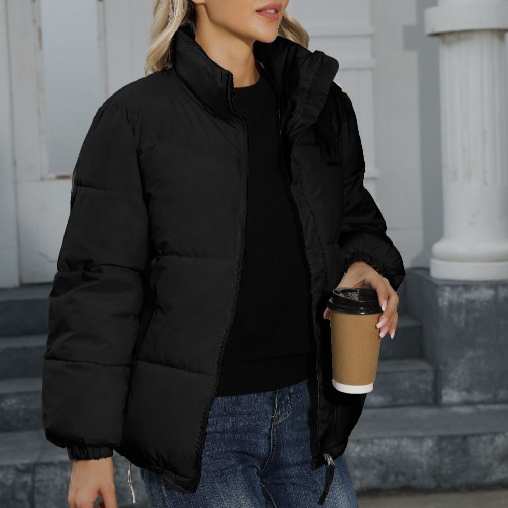 Woman wearing Snuvelle loose fit thick winter jacket in a solid color