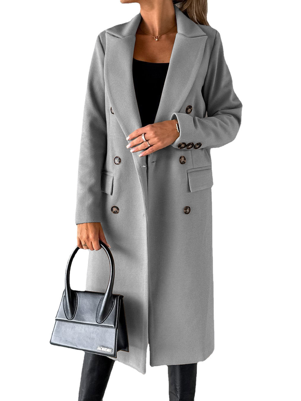 Woman wearing Snuvelle slim double-breasted lapel coat in a solid color