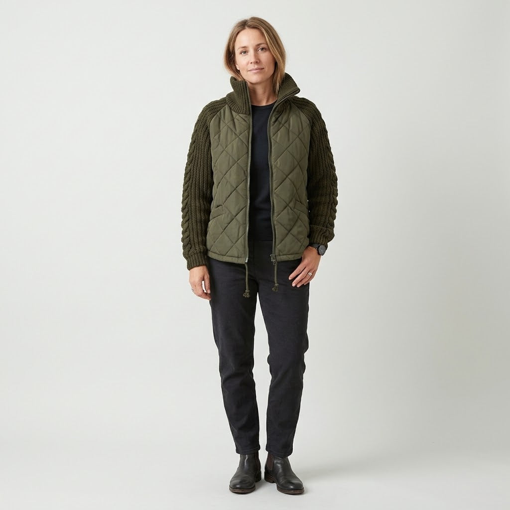 Woman wearing Snuvelle stand collar zip-up winter jacket with pockets
