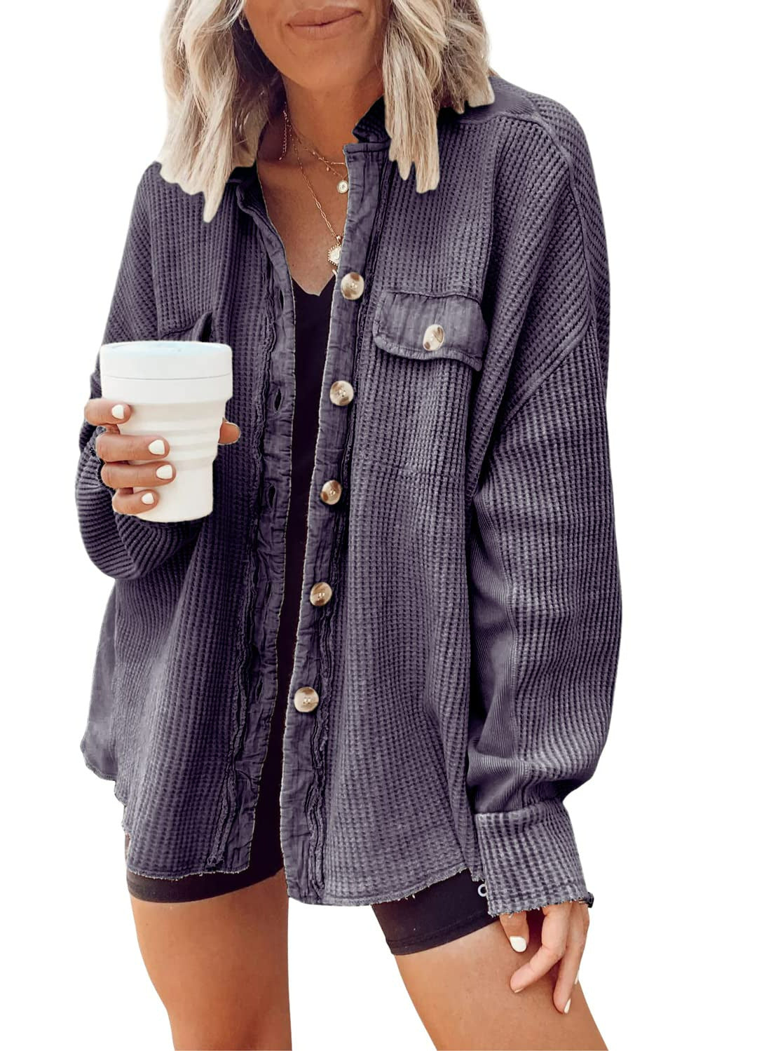 Woman wearing Snuvelle button-up lapel shirt jacket in a solid color