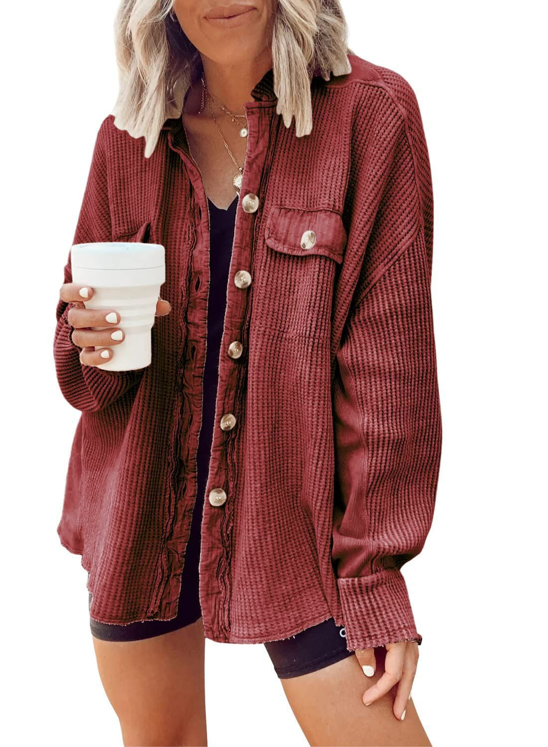 Woman wearing Snuvelle button-up lapel shirt jacket in a solid color