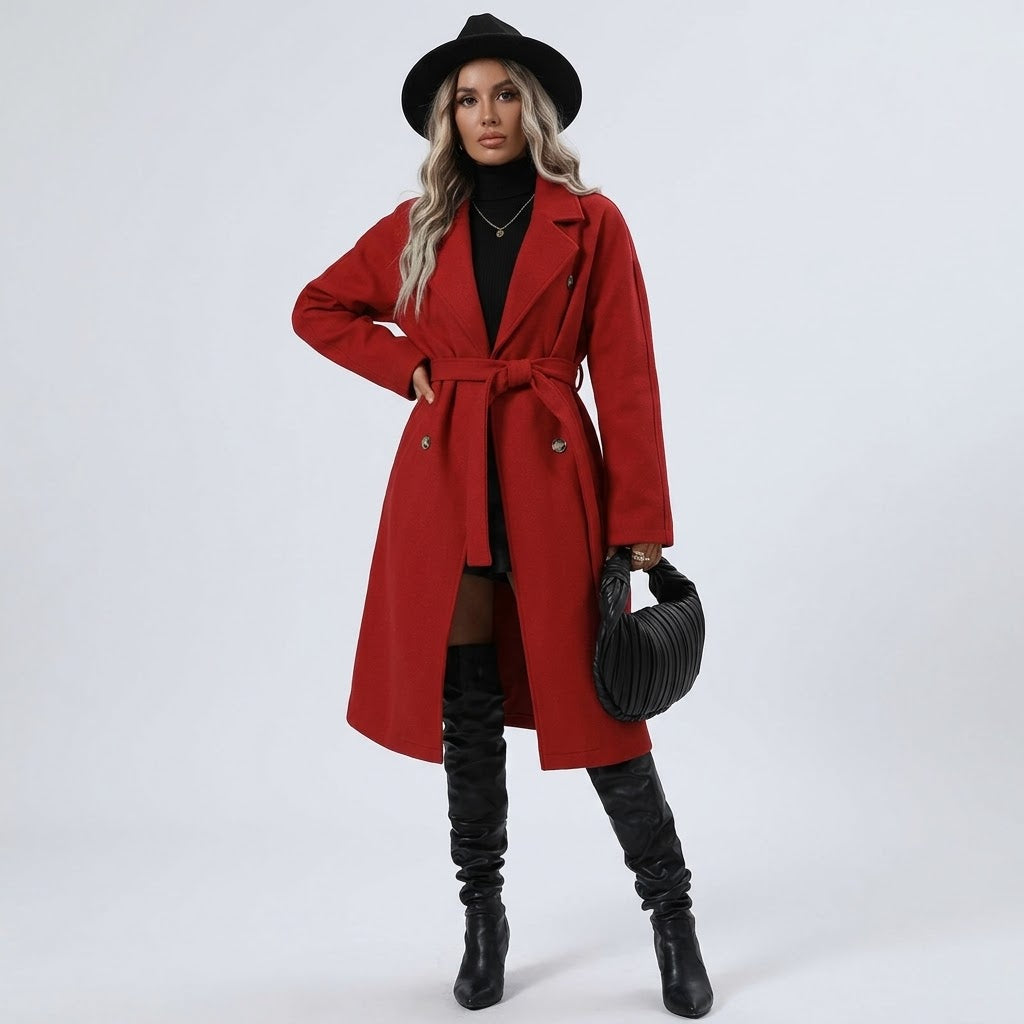 Woman wearing Snuvelle double-breasted belted trench coat with lapel collar