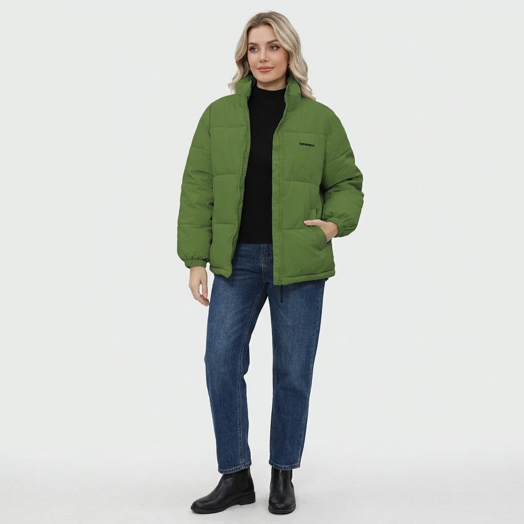 Woman wearing Snuvelle loose fit thick winter jacket in a solid color