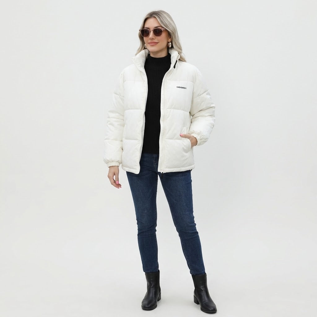 Woman wearing Snuvelle loose fit thick winter jacket in a solid color