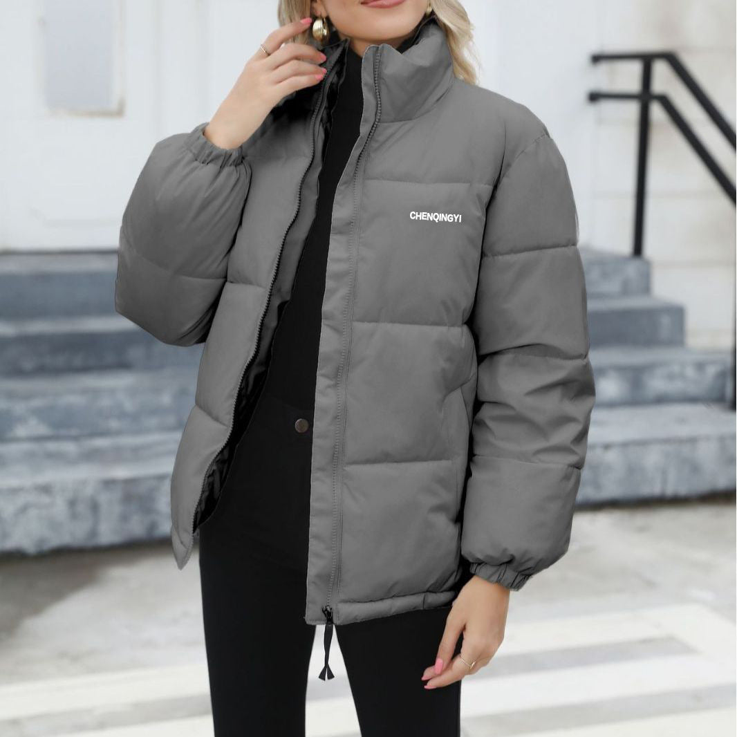 Woman wearing Snuvelle loose fit thick winter jacket in a solid color