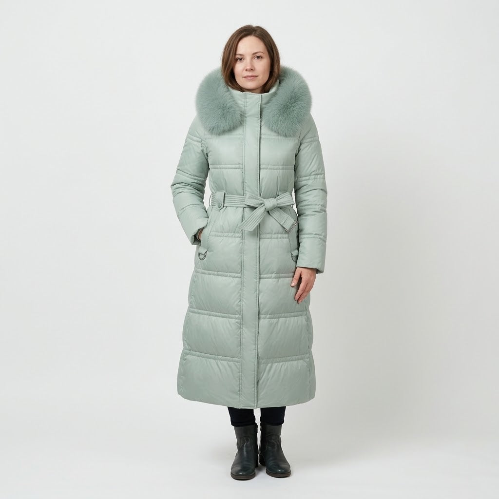 Woman wearing Snuvelle slim belted hooded winter coat with fur-trimmed hood