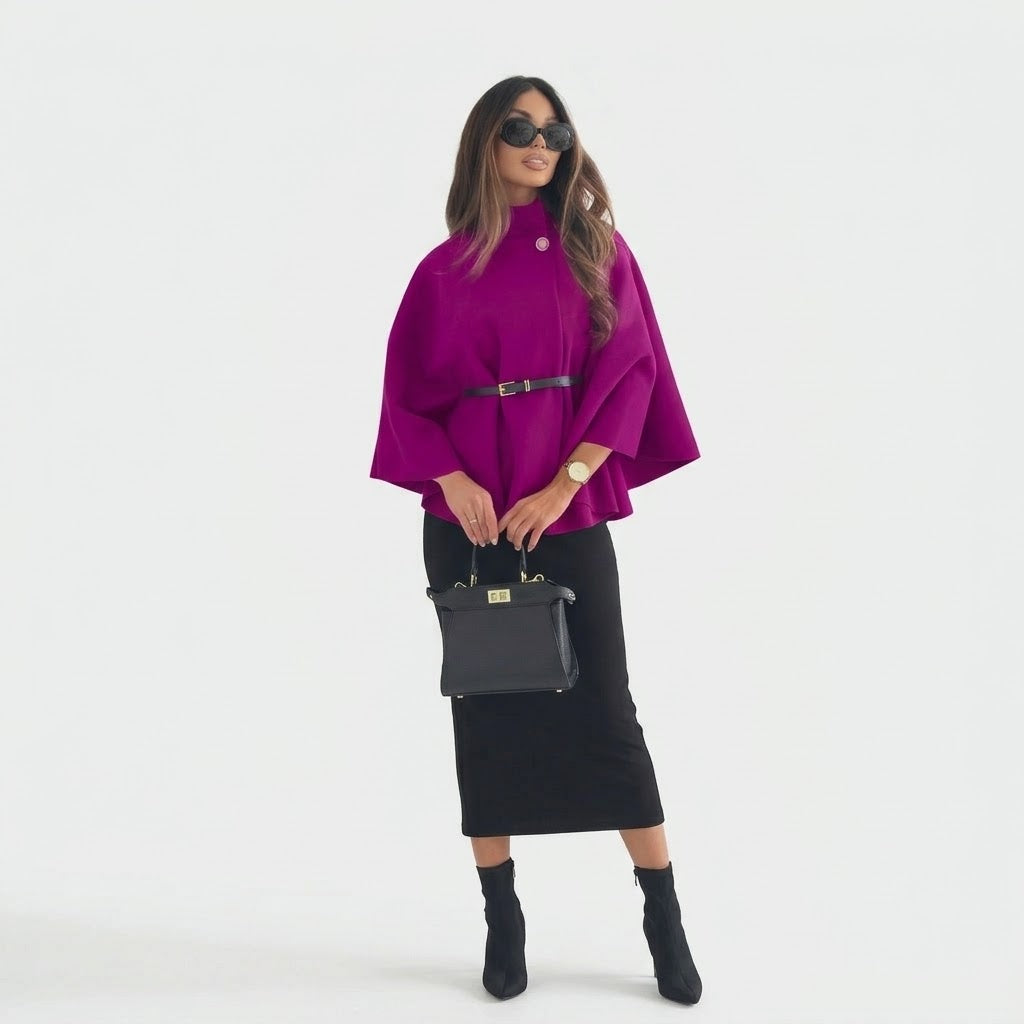 Woman wearing Snuvelle stand collar batwing belted jacket in a solid color