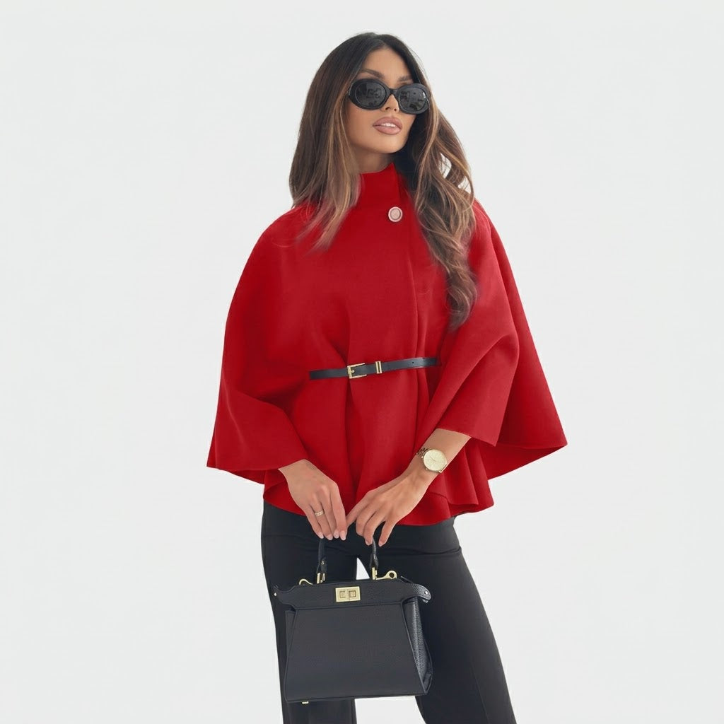 Woman wearing Snuvelle stand collar batwing belted jacket in a solid color
