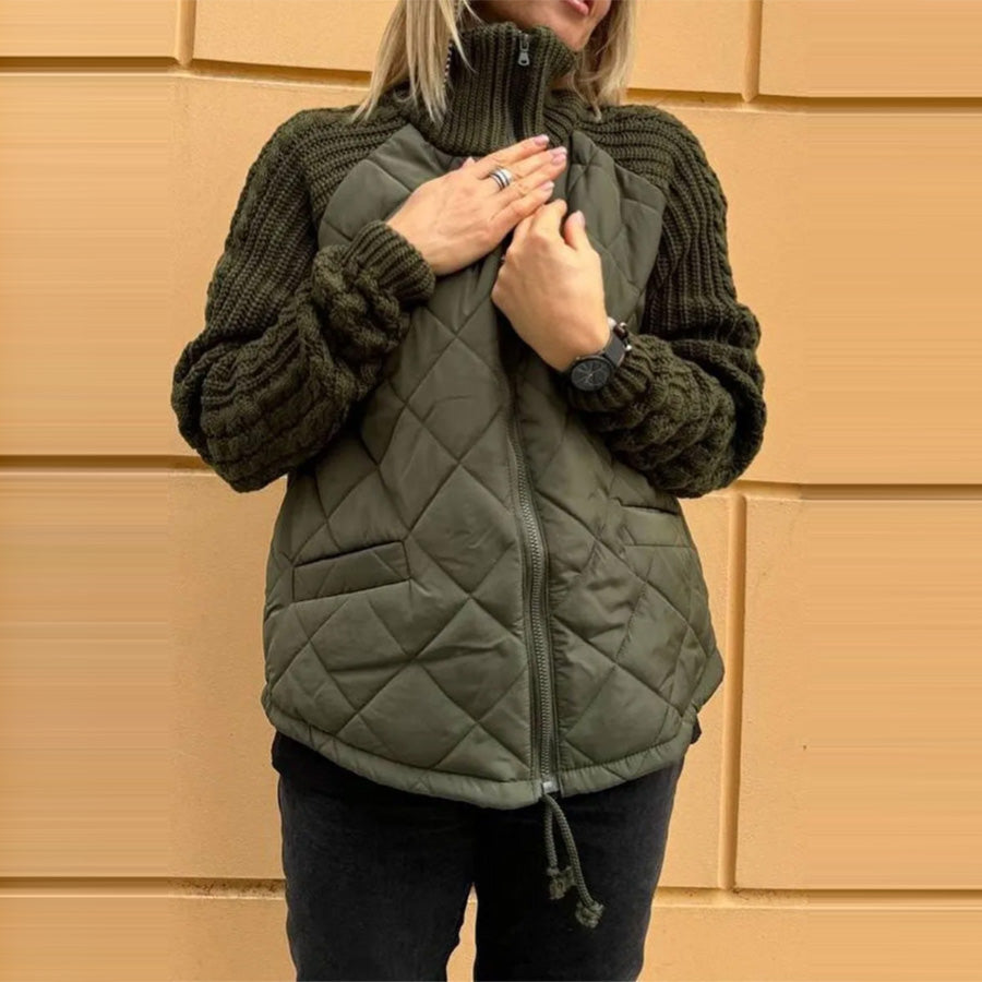 Woman wearing Snuvelle stand collar zip-up winter jacket with pockets