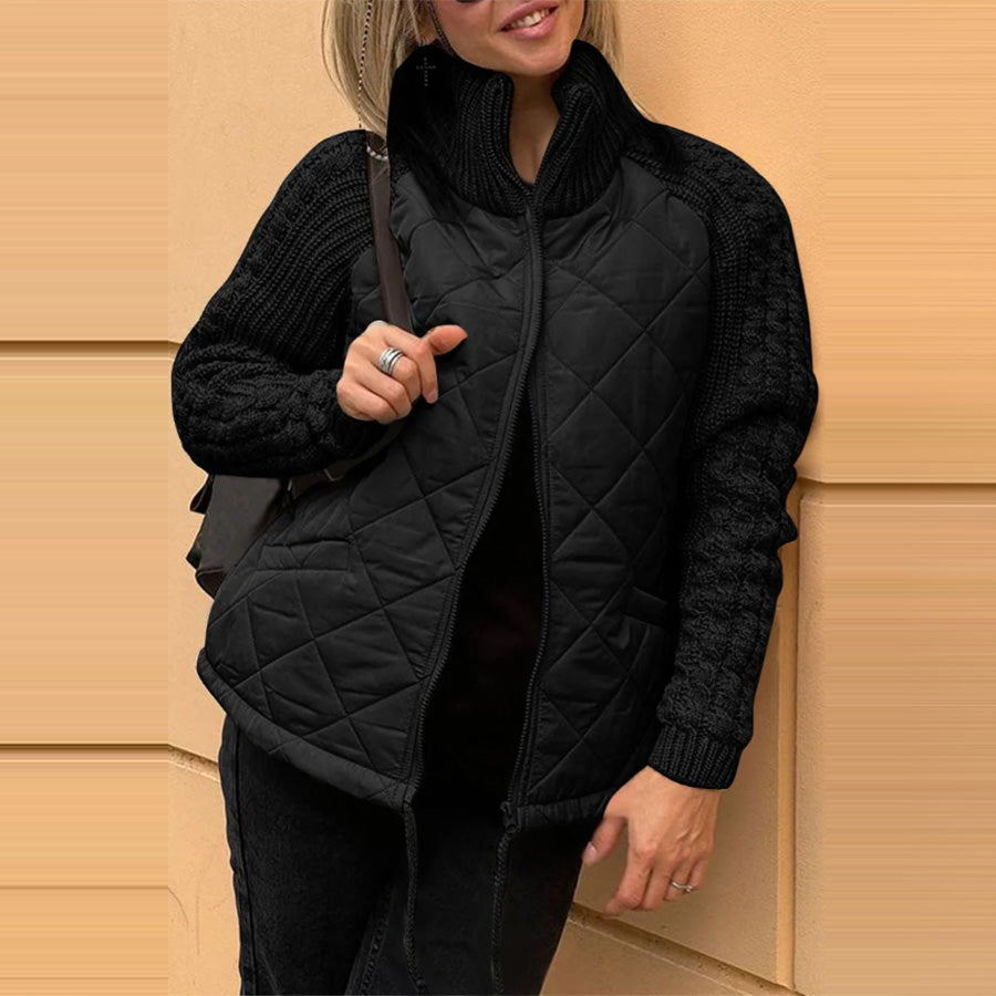 Woman wearing Snuvelle stand collar zip-up winter jacket with pockets